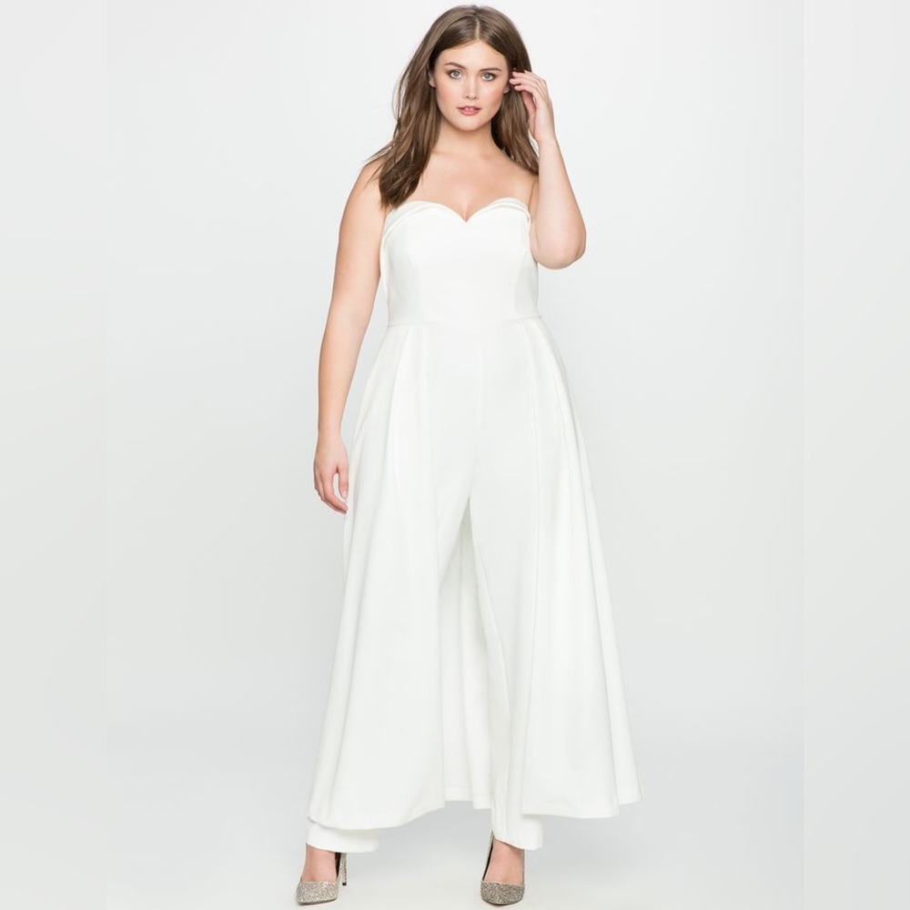 White strapless jumpsuit with dramatic cape